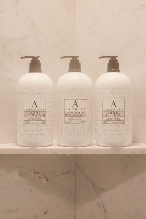 Archive Green Tea & Willow luxury hotel bath set featuring three elegant full-sized bottles.