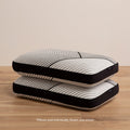 Two Beautyrest Black Luxury Foam Pillows stacked in a bedroom
