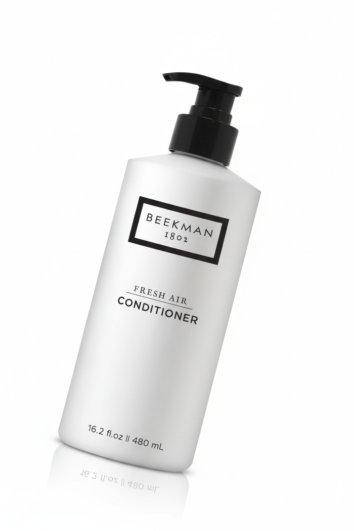 Beekman 1802 Fresh Air Conditioner angled product shot white frosted bottle black pump minimalist label - luxury conditioner 16.2 oz