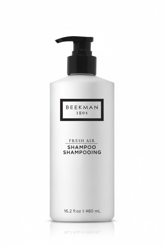Beekman 1802 Fresh Air Shampoo product detail white frosted bottle black pump minimalist label clean background - luxury shampoo 16.2 oz