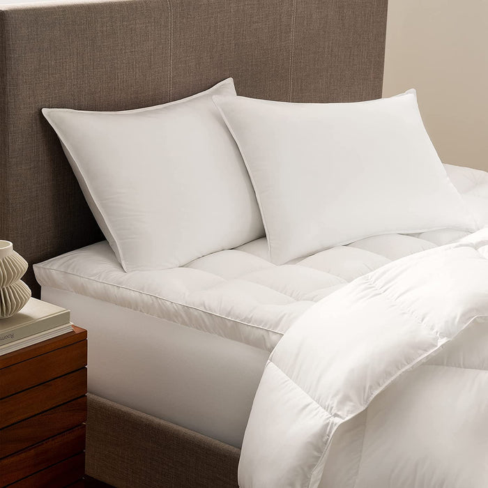 Down Dreams Duck Feather Pillow set on a stylish bed, featuring soft, all-natural materials for comfort and support. 
own Dreams Classic Pillow on hotel bed - premium duck feather and down fill soft support
luxury hotel pillow used in Hilton Marriott properties