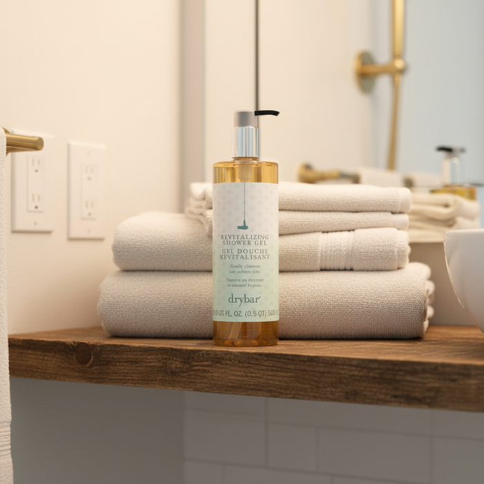 Drybar Revitalizing Shower Gel in upscale Airbnb bathroom — premium STR hotel body wash