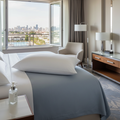 Envirosleep Dream Surrender II Pillow on soft blue-gray hotel sheets - down alternative luxury