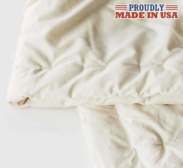 Close-up detail of Turmerry made in USA lightweight natural wool comforter quilting.