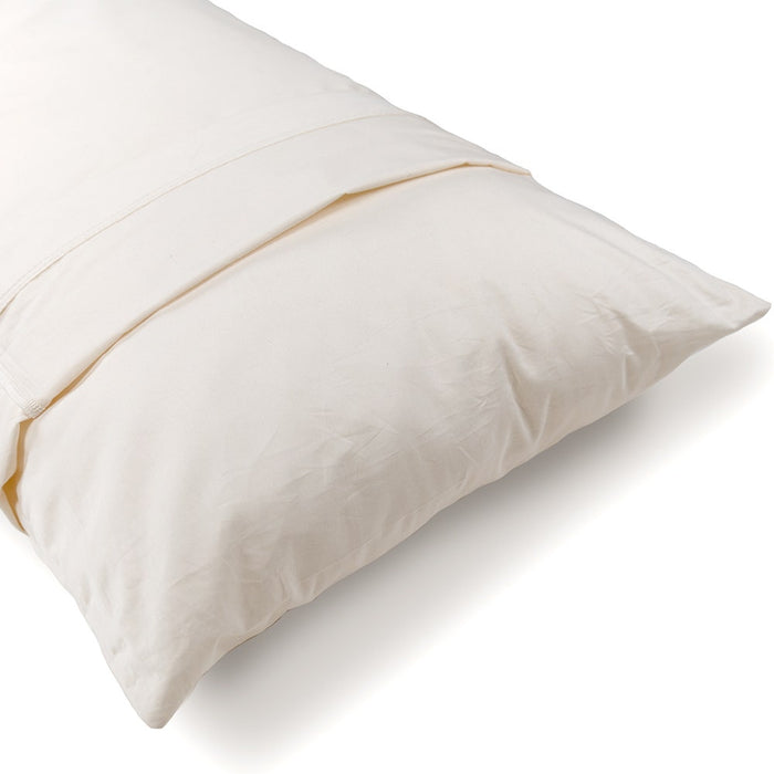 close up Naturepedic Non-Toxic Body Pillow dressed with a sham
