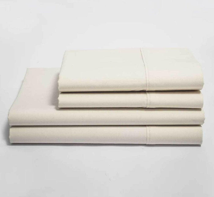 Turmerry organic cotton percale sheet set folded and stacked.