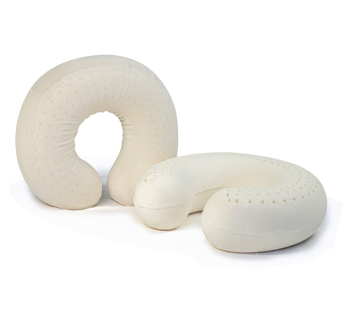 Two Turmerry latex travel pillows with white covers, one upright, displayed together on white background.