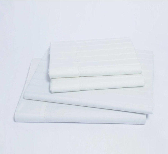 Turmerry organic luxury sateen striped white bed sheet set folded and stacked.