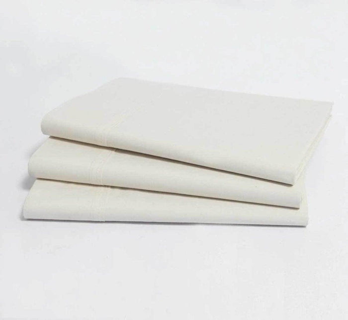 Turmerry organic sateen natural color sheet set folded and stacked.