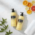 Flat Lay - Both Bottles with Citrus Slices