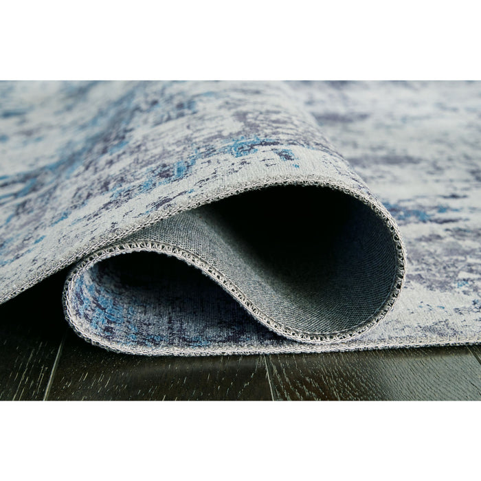 Putmins Area Rug