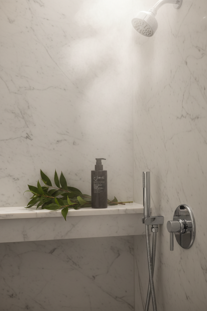 Sodashi Botanical Body Wash in luxury hotel shower scene