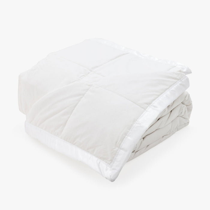 Full view of The Pillow Bar All Season White Down Blanket Folded